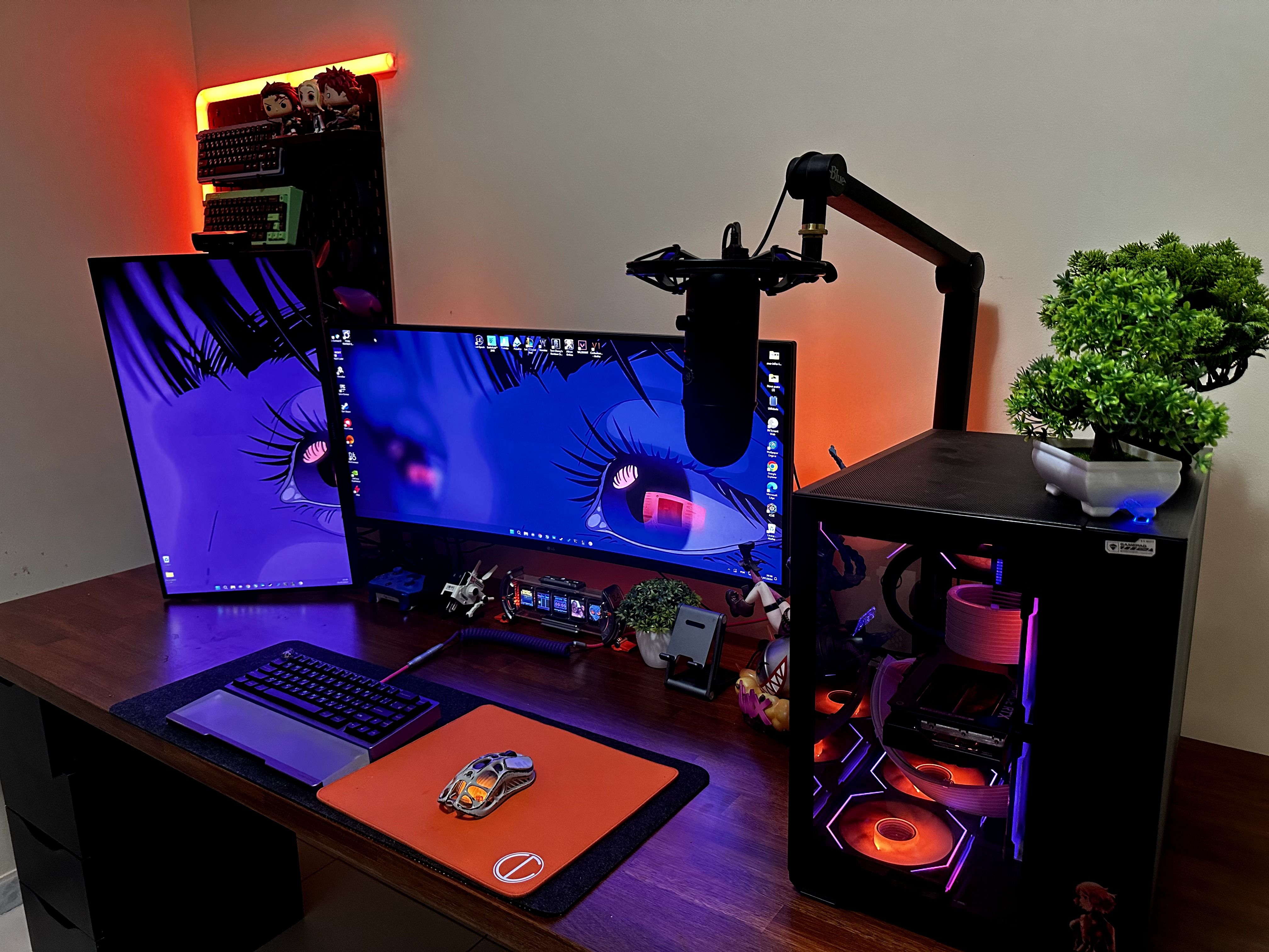 A technician checking internal layout components of a customized gaming PC casing